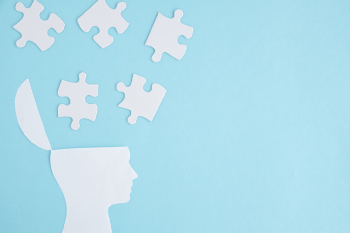 white-jigsaw-puzzles-open-head-blue-background_23-2147873823