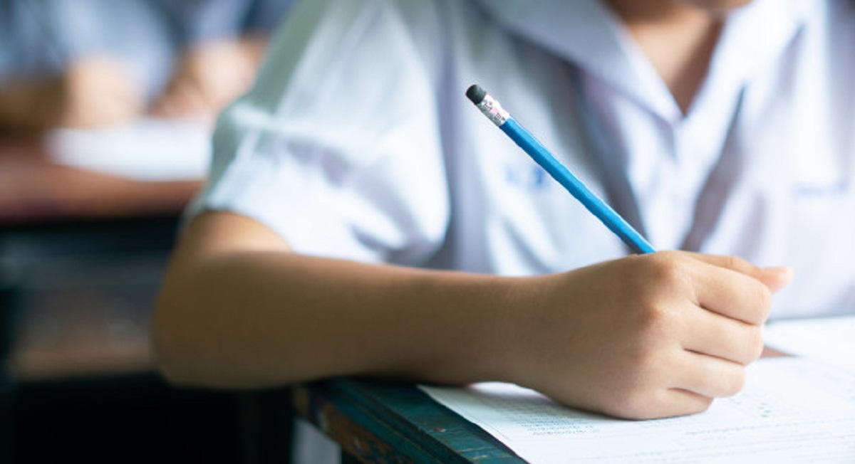student-doing-test-classroom_73622-1125