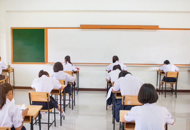 Behind girls group undergraduate students testing of examination