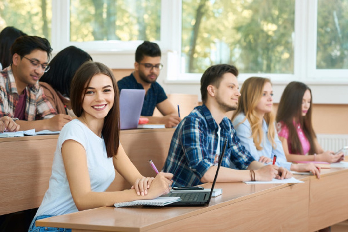 young-student-looking-camera-sitting-university_7502-1107